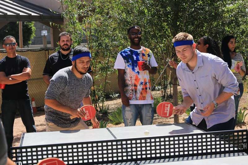 balboa capital employees playing ping pong
