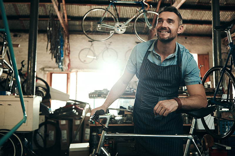 bike shop owner in his store