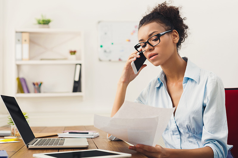young female making an important telephone call