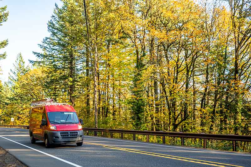 red van on the highway