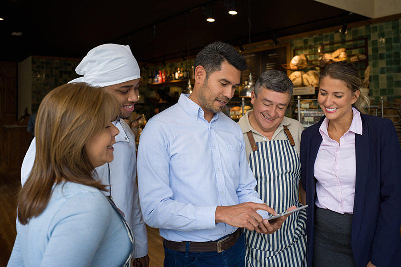 team of restaurant workers planning for the big day