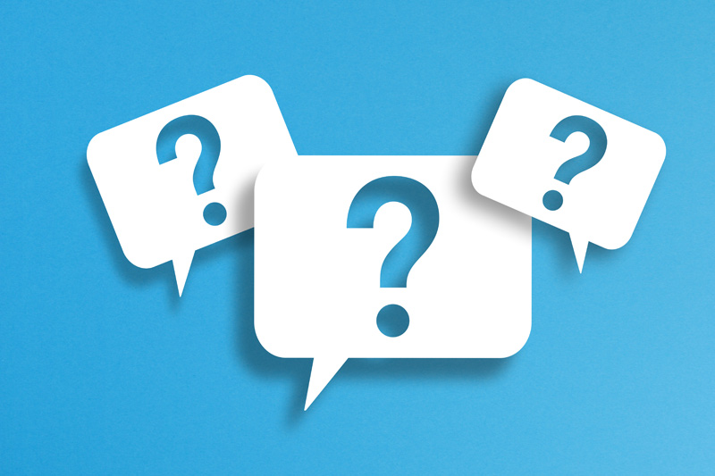 question marks against blue background, faq page